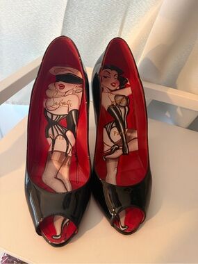 Christian Louboutin “tattooed” Lady Peep pumps